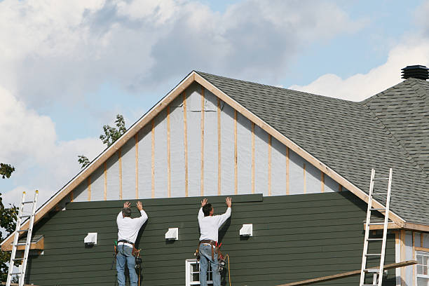 Professional Emergency Siding Repair technician working in Manchester, OH
